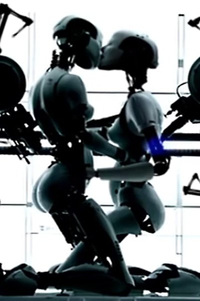 Robot Bjork holding and kissing another Robot Bjork.
