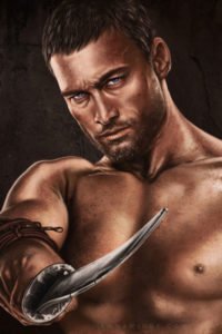 A bare-chested man brandishes his sword.