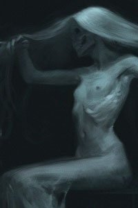 An emaciated, ghostly pale woman sits nude, fingering her long white hair.